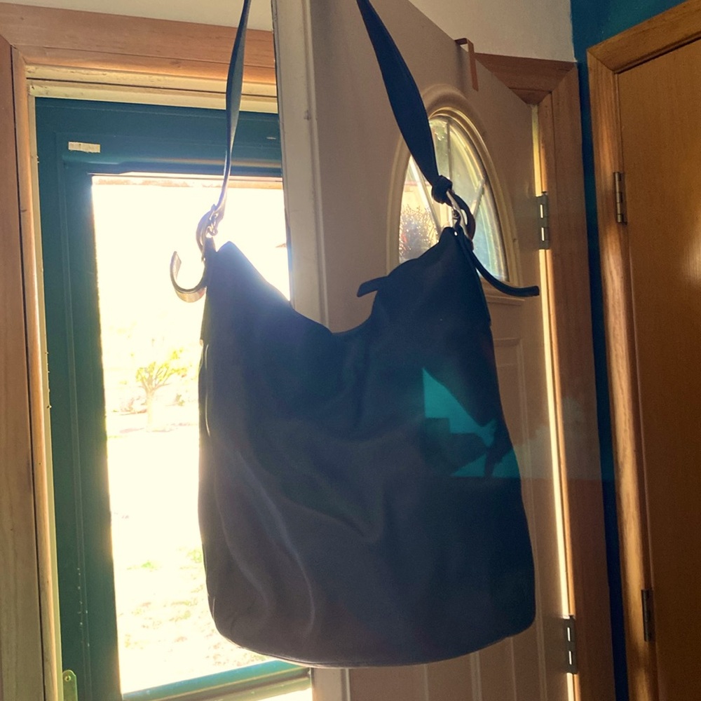 A Coach black leather hobo bag